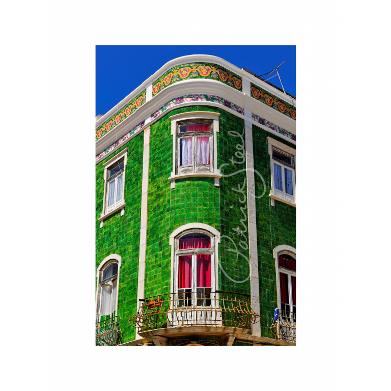 old town lagos portugal green tiled building by photographer patrick steel